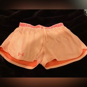 Orange mesh workout shorts